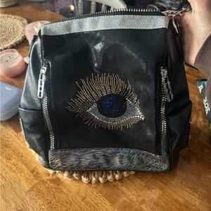 Black Backpack with Eye Design